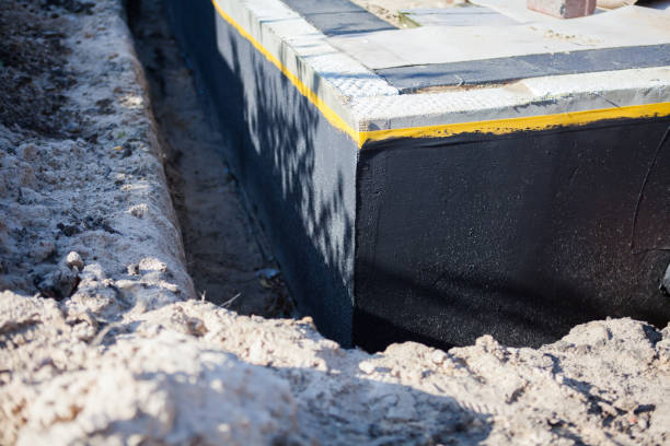 Professional Exterior Waterproofing technician working in Memphis, MI